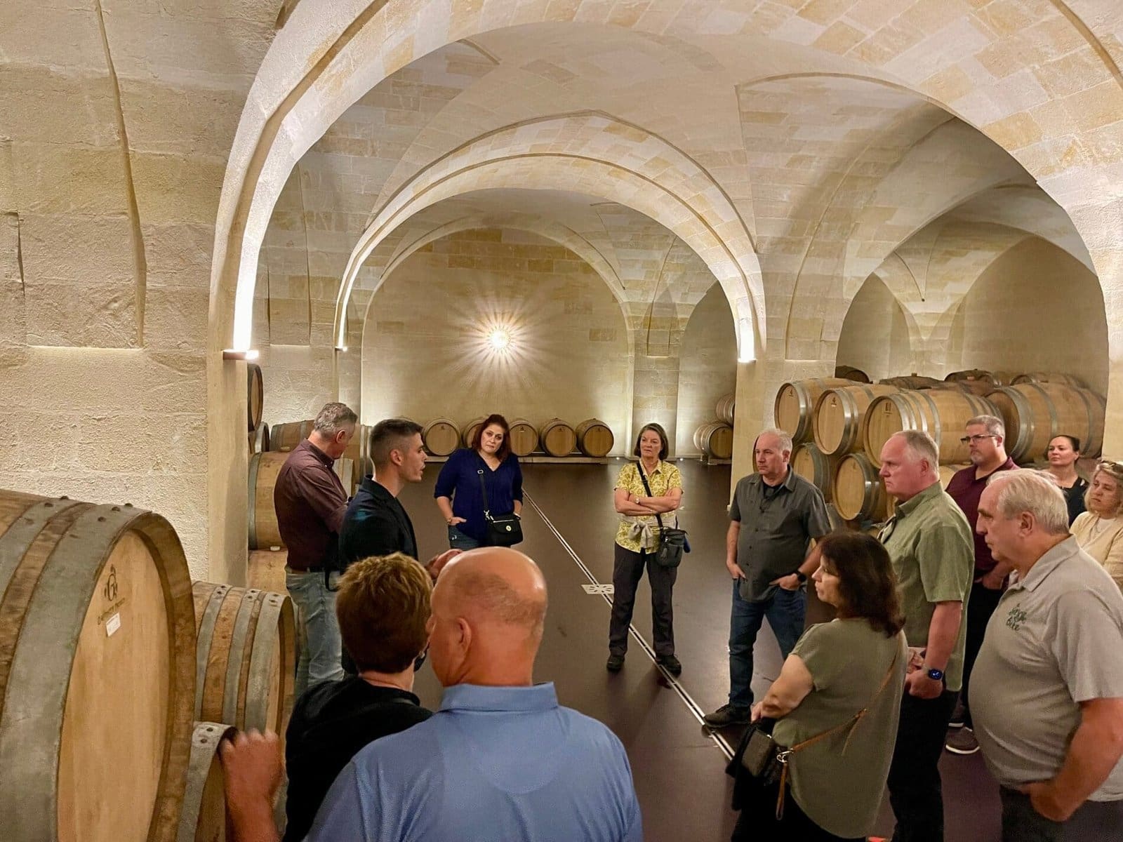Small group winery tour inside the Giann Franco Fino cellar in Apulia.